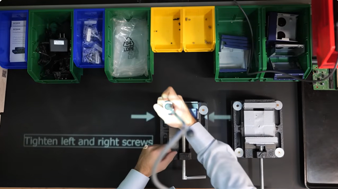 Active visual guidance displaying Tighten left and right screws with directional arrows